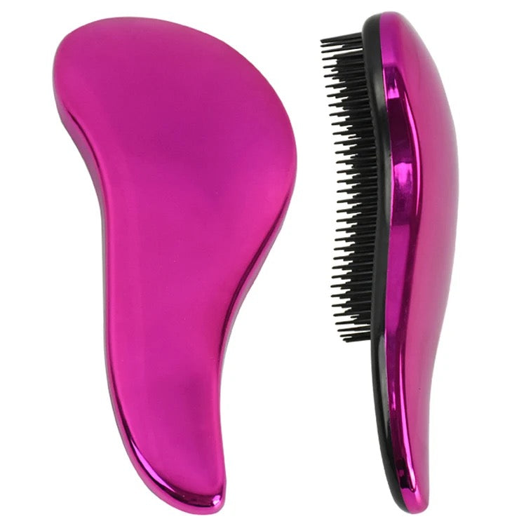 Ethan Thomas detangle brush pink